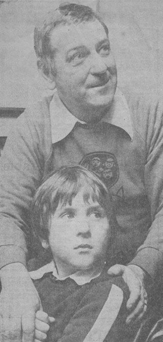Julian Martin, aged 9, with his father, Bill Martin